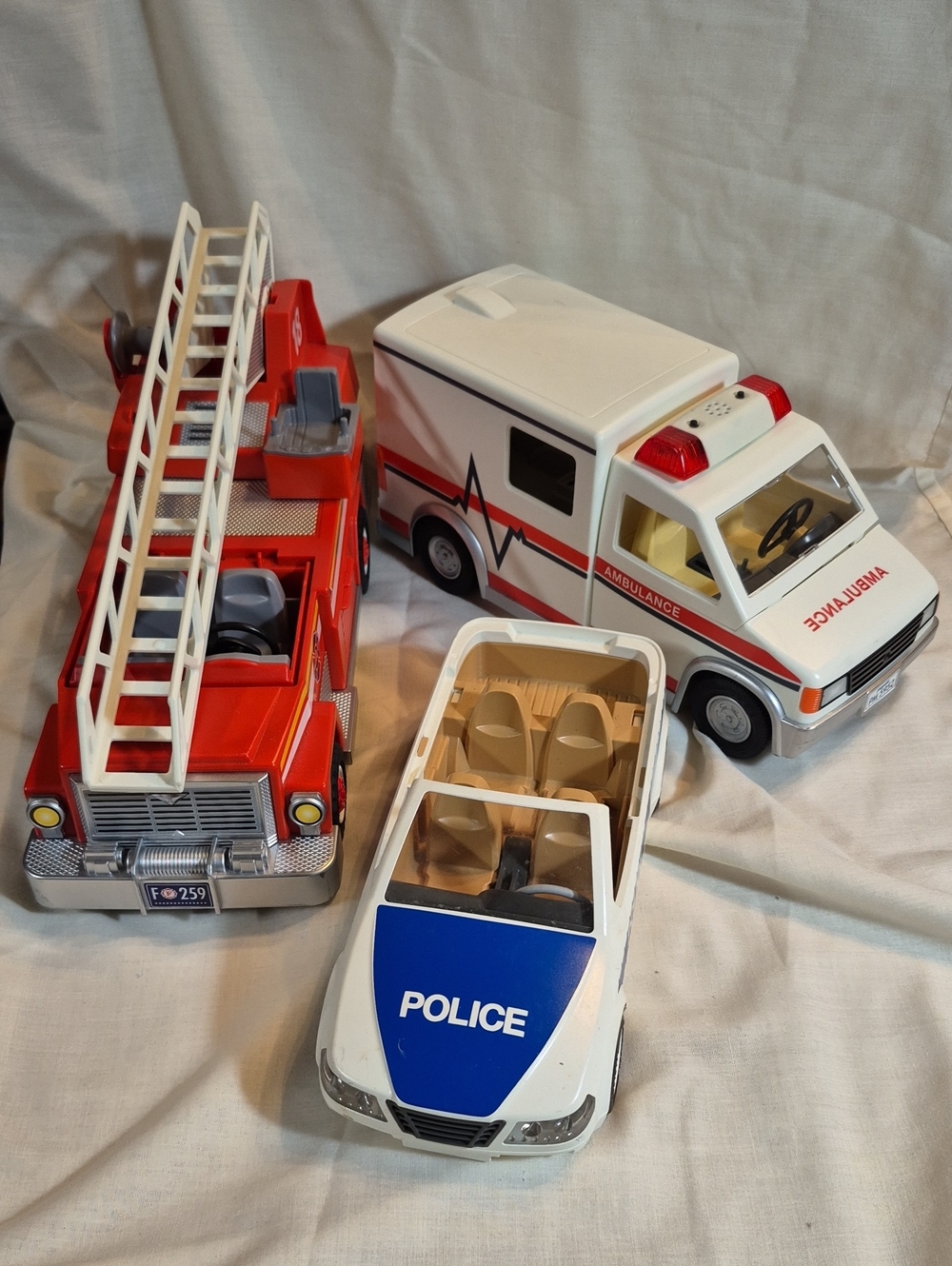 Three Playmobile Rescue Vehicles